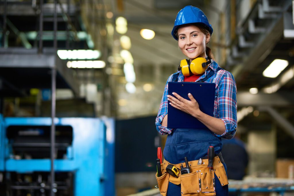 Young Woman Working at Factory