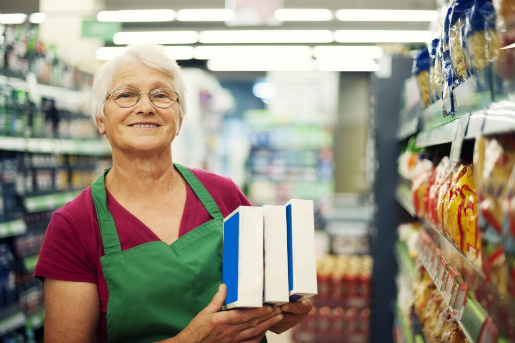 Senior woman working at supermarket