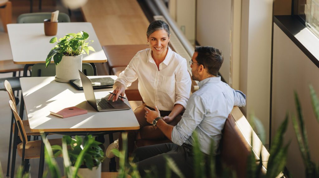 Business partners having meeting in coworking office space